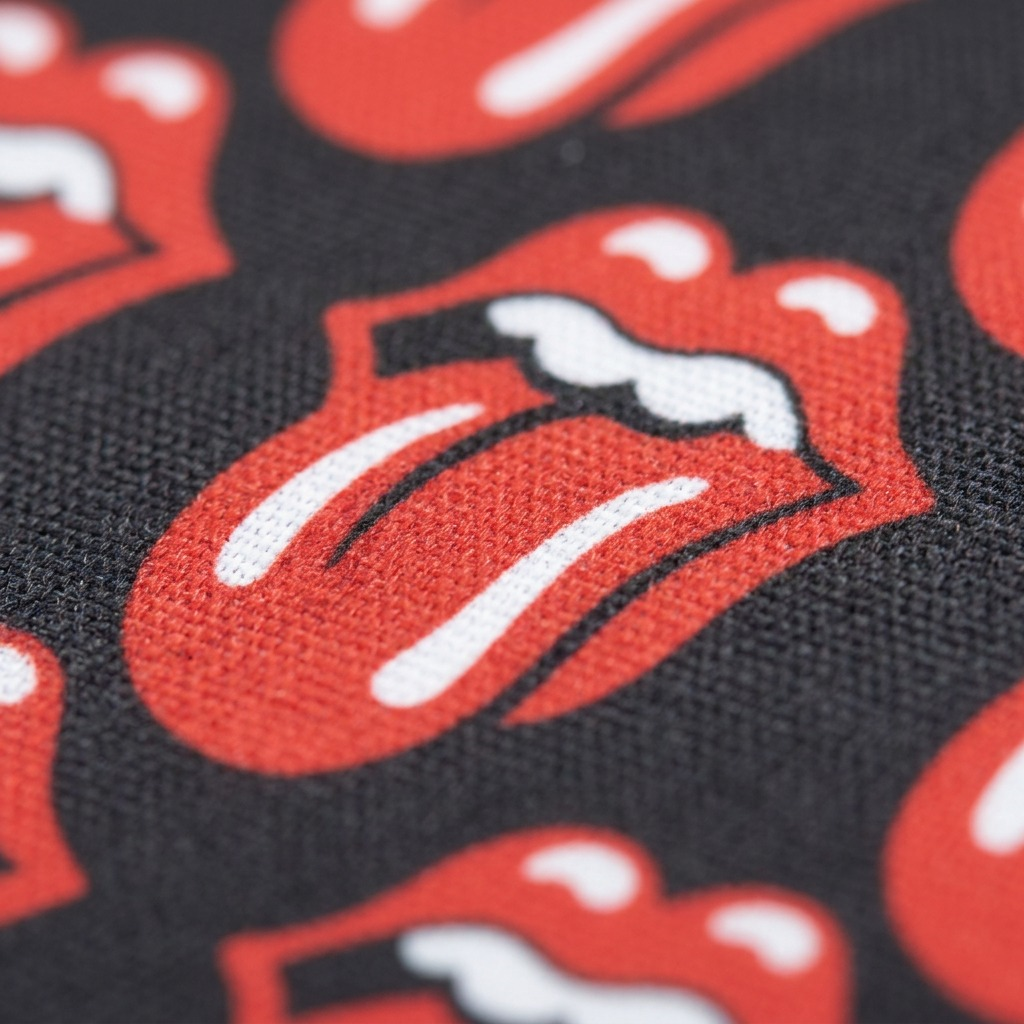 Close-up detail of the woven polyester fabric on The Rolling Stones laptop sleeve.