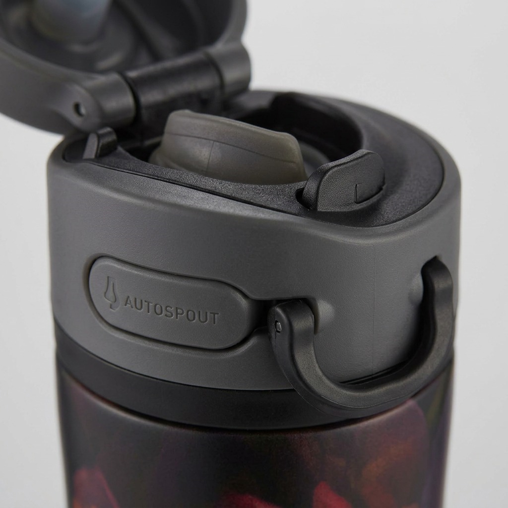 An extreme close-up of the AUTOSPOUT lid mechanism on the Contigo water bottle, focusing on the release button, drink spout, and handle hinge details.
