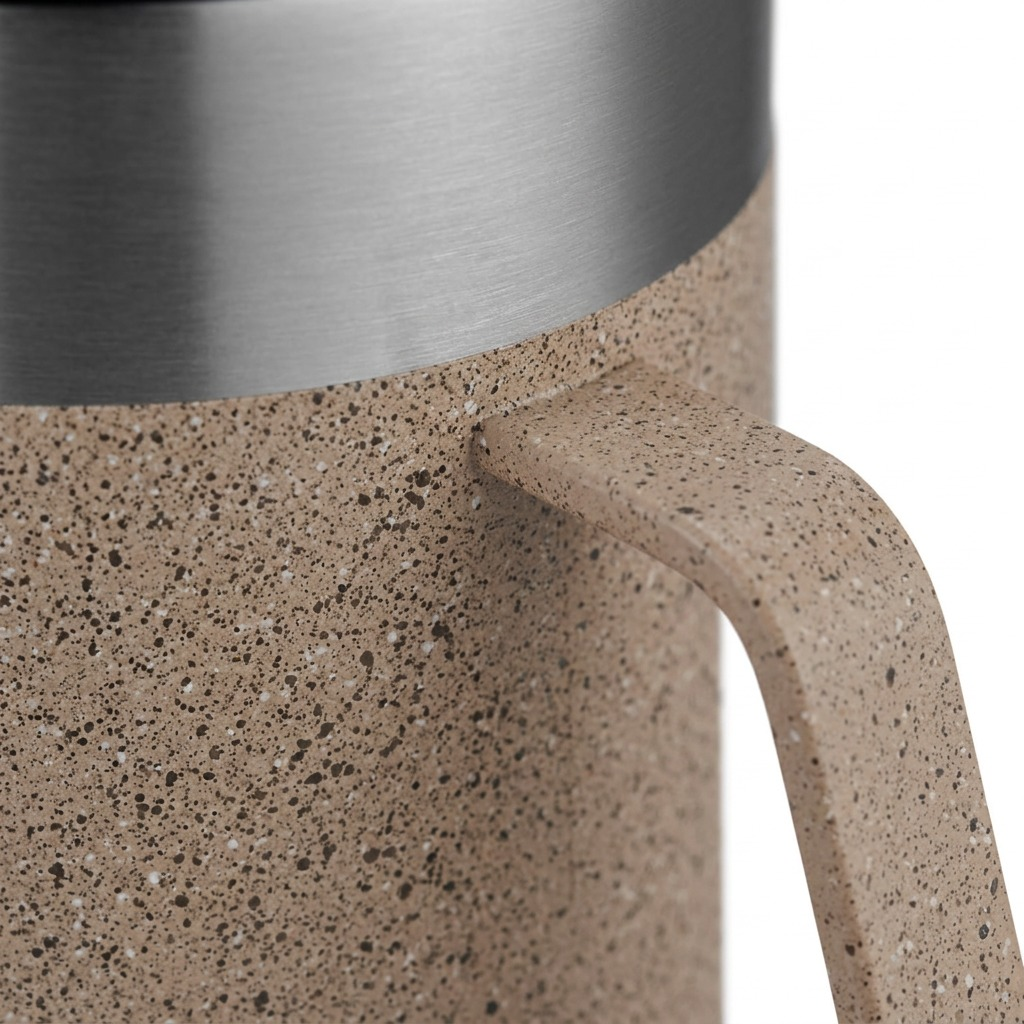 A macro view of the Contigo mug showing the transition from steel collar to speckle body finish.